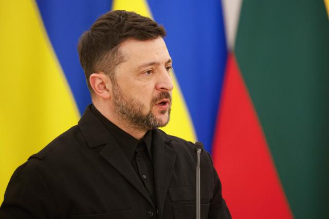 Ukraine's President Volodymyr Zelensky speaks during a joint press conference with Lithuania's President and Poland's President, after attending commemorations of the 1863 uprising, in Vilnius on January 25, 2026. (Photo by Petras Malukas / AFP)