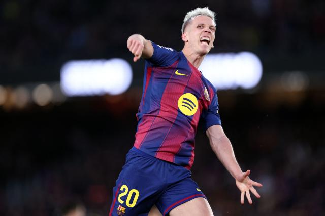 Barcelona's Spanish midfielder #20 Daniel Olmo celebrates scoring the opening goal during the Spanish league football match between FC Barcelona and Real Oviedo at Camp Nou Stadium in Barcelona on January 25, 2026. (Photo by Josep LAGO / AFP)