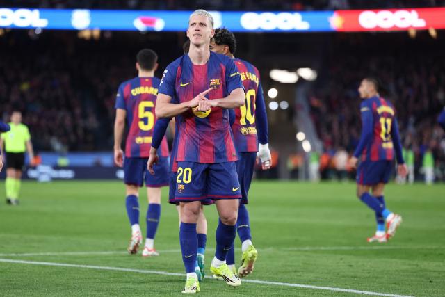 Barcelona's Spanish midfielder #20 Daniel Olmo celebrates scoring the opening goal during the Spanish league football match between FC Barcelona and Real Oviedo at Camp Nou Stadium in Barcelona on January 25, 2026. (Photo by Josep LAGO / AFP)