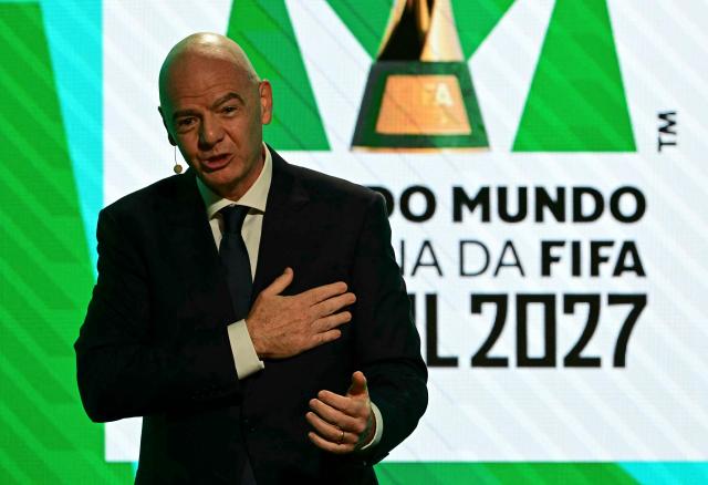 FIFA President Gianni Infantino speaks in front of a screen displaying the 2027 FIFA Women's World Cup logo, during the launch ceremony in Rio de Janeiro, Brazil on January 25, 2026. (Photo by Pablo PORCIUNCULA / AFP)