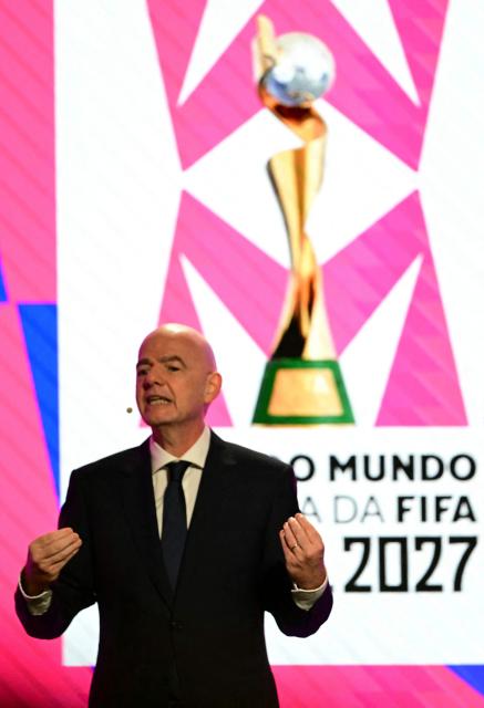 FIFA President Gianni Infantino speaks in front of a screen displaying the 2027 FIFA Women's World Cup logo, during the launch ceremony in Rio de Janeiro, Brazil on January 25, 2026. (Photo by Pablo PORCIUNCULA / AFP)