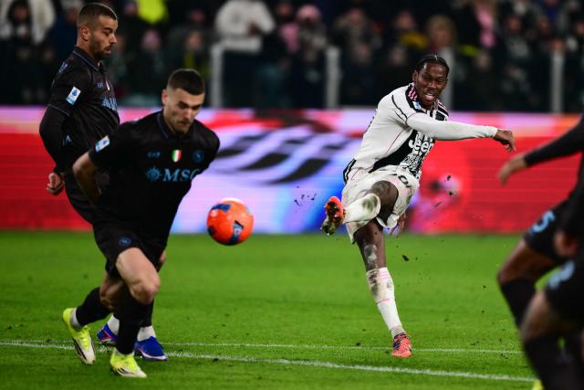 Juventus' Canadian forward #30 Jonathan David (R) takes a shot during the Italian Serie A football match between Juventus and Napoli at the Allianz Stadium in Turin on January 25, 2026. (Photo by MARCO BERTORELLO / AFP)