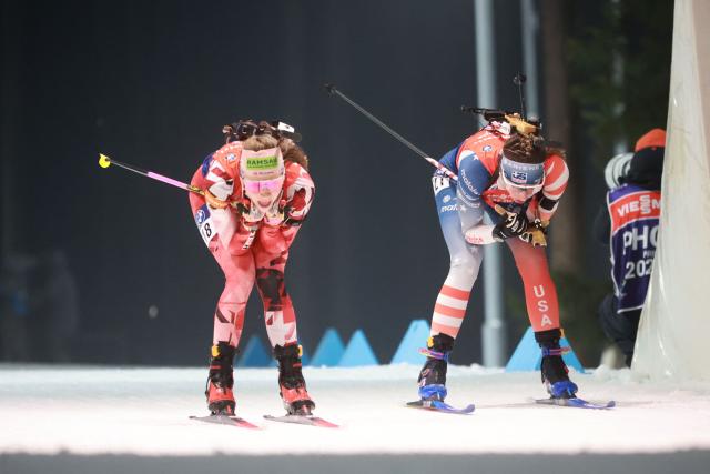 Austria's Tamara Steiner (L) and US' Deedra Irwin compete in the women's 12.5 km mass start competition of the IBU Biathlon World Cup in Nove Mesto, Czech Republic, on January 25, 2026. (Photo by Radek MICA / AFP)