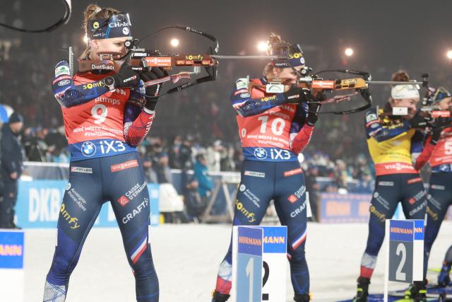 France's Oceane Michelon (L), France's Julia Simon (2nd L) and France's Lou Jeanmonnot-Laurent compete in the women's 12.5 km mass start competition of the IBU Biathlon World Cup in Nove Mesto, Czech Republic, on January 25, 2026. (Photo by Radek MICA / AFP)