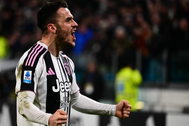Juventus' Serbian midfielder #18 Filip Kostic celebrates after scoring a goal during the Italian Serie A football match between Juventus and Napoli at the Allianz Stadium in Turin on January 25, 2026. (Photo by MARCO BERTORELLO / AFP)