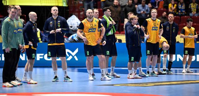 Sweden's national team looks dejected after their loss in the men's EHF Euro 2026 main round handball match Iceland v Sweden in Malmoe, Sweden, on January 25, 2026. (Photo by Johan Nilsson/TT / TT News Agency / AFP) / Sweden OUT