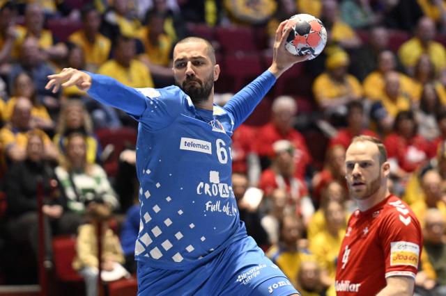 Croatia's right winger #06 Mario Sostaric jumps to throw during the men's EHF Euro 2026 main round handball match Switzerland v Croatia in Malmo, Sweden, on January 25, 2026. (Photo by Johan Nilsson/TT / TT NEWS AGENCY / AFP) / Sweden OUT