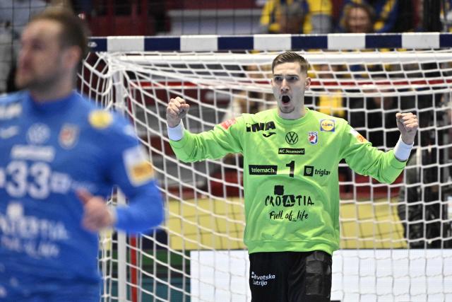 Croatia's goalkeeper #01 Dominik Kuzmanovic reacts during the men's EHF Euro 2026 main round handball match Switzerland v Croatia in Malmo, Sweden, on January 25, 2026. (Photo by Johan Nilsson/TT / TT NEWS AGENCY / AFP) / Sweden OUT