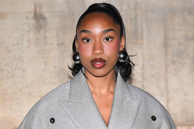 French influencer Salima Poumbga aka Crazy Sally poses for a photocall upon arrival to attend the Jacquemus Menswear ready-to-wear Fall-Winter 2026/2027 collection as part of the Men Paris Fashion Week in Paris on January 25, 2026. (Photo by Blanca CRUZ / AFP)