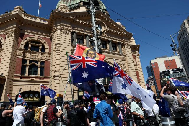 Demonstrators gather to take part in the annual "Invasion Day" protest march through the streets of Melbourne on Australia Day on January 26, 2026. (Photo by Izhar KHAN / AFP)