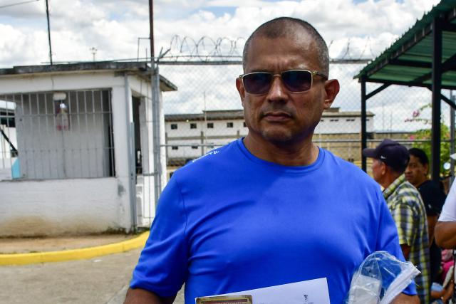 Manuel Mora looks on as he leaves the "Centro de Formaciуn Hombre Nuevo” prison in Tocuyito, Carabobo State, Venezuela, on January 25, 2026. More than 100 political prisoners were freed on January 25 in Venezuela, where detainees are slowly being released under pressure from the United States, the non-governmental organization Foro Penal said. (Photo by AFP)