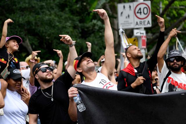 Protesters take part in the annual "Invasion Day" rally, organised on Australia Day, in Sydney on January 26, 2026. (Photo by Steven Markham / AFP)