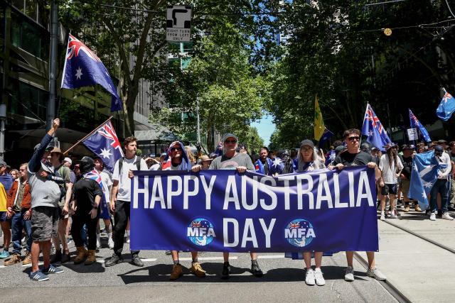 Anti-government protesters take part in a rally on a road on Australia Day in Melbourne on January 26, 2026. (Photo by Izhar KHAN / AFP)