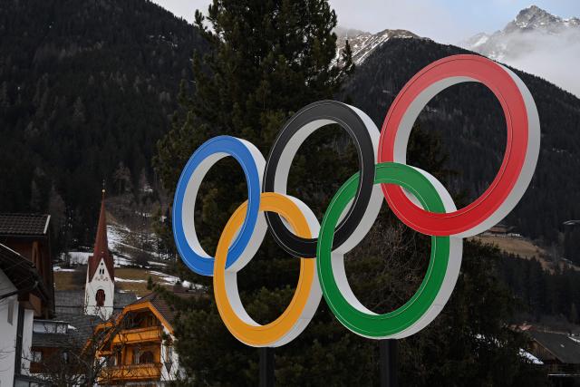 (FILES) A picture shows the Olympic Rings in Antholz, the village that will host the biathlon competitions during Milano Cortina 2026 Olympic Games, on January 22, 2025. (Photo by MARCO BERTORELLO / AFP)