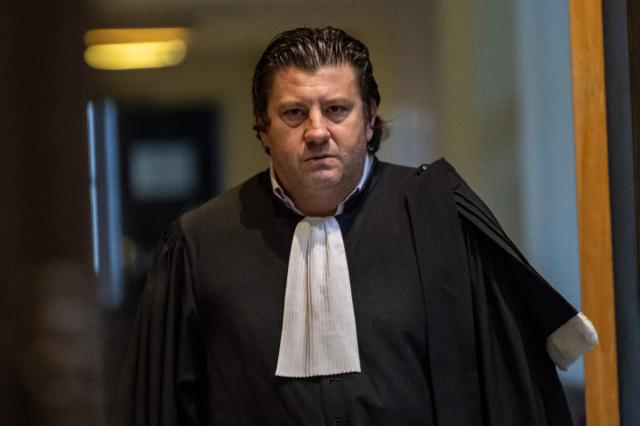 French lawyer Guillaume de Palma, representing French far-right Rassemblement National's MP Marie-France Lorho (not pictured) arrives for the verdict in her trial for embezzlement of public funds, at the Marseille courthouse on January 26, 2026. Mayor of Orange Yann Bompard was sentenced  to five years of ineligibility  and an 18-month suspended prison term for holding a fictitious job as a parliamentary assistant. The Marseille criminal court also sentenced Marie-France Lorho to five years of ineligibility with immediate enforceability for failing to terminate this parliamentary assistant employment contract. (Photo by MIGUEL MEDINA / AFP)