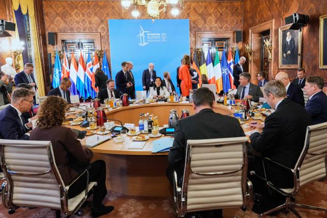 German Economy and Energy Minister Katherina Reiche (C) speaks during opening session of the North Sea Summit in Hamburg, northern Germany, where the North Sea coastal states aim to strengthen cross-border cooperation in the expansion of offshore wind energy and hydrogen infrastructure on January 26, 2026. European leaders and Energy ministers meet in Germany to discuss North Sea energy and security cooperation, but fears over US designs on the Arctic island of Greenland may overshadow the talks. (Photo by Martin Meissner / Pool / AFP)