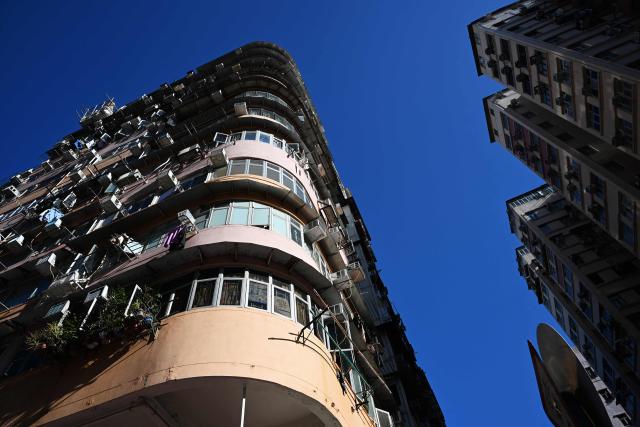 Mid-century corner house architecture is seen in the Sham Shui Po district of Hong Kong on January 26, 2026. (Photo by Peter PARKS / AFP)