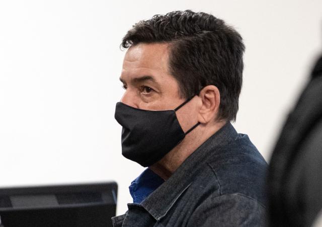 Slovak businessman Marian Kocner, accused of ordering the killing of journalist Jan Kuciak and his fiancee Martina Kusnirova,  attends a retrial at Slovak Specialized court in Pezinok, Slovakia, on January 26, 2026. Jan Kuciak, a journalist investigating high-level corruption linked to influential businessmen and top politicians, was shot dead with his fiancee, Martina Kusnirova, both 27, at their home in the village of Velka Maca in February 2018. Their deaths sparked the largest protests in Slovakia since the fall of Communism, leading to the resignation of the government of Robert Fico, although the nationalist prime minister returned to power in 2023. (Photo by Joe Klamar / AFP)