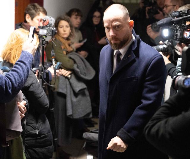 Attorney Marek Paran, lawyer of Slovak businessman Marian Kocner (unseen), accused of ordering the killing of journalist Jan Kuciak and his fiancee Martina Kusnirova, arrives at a Slovak Specialized court in Pezinok, Slovakia, on January 26, 2026. Jan Kuciak, a journalist investigating high-level corruption linked to influential businessmen and top politicians, was shot dead with his fiancee, Martina Kusnirova, both 27, at their home in the village of Velka Maca in February 2018. Their deaths sparked the largest protests in Slovakia since the fall of Communism, leading to the resignation of the government of Robert Fico, although the nationalist prime minister returned to power in 2023. (Photo by Joe Klamar / AFP)