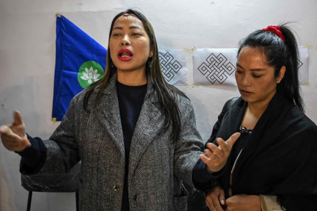 Numa Limbu (L), a third-gender woman and Inclusive Socialist Party contestant, speaks during a press conference in Kathmandu on January 26, 2026, ahead of the country's general election on March 5. Nepali sexual and gender minorities unveiled their candidates in a new political party on January 26 ahead of March elections, challenging an ageing political elite ousted in last year's mass uprising. (Photo by Prakash MATHEMA / AFP) / To go with 'Nepal-Politics-LGBTIQ'