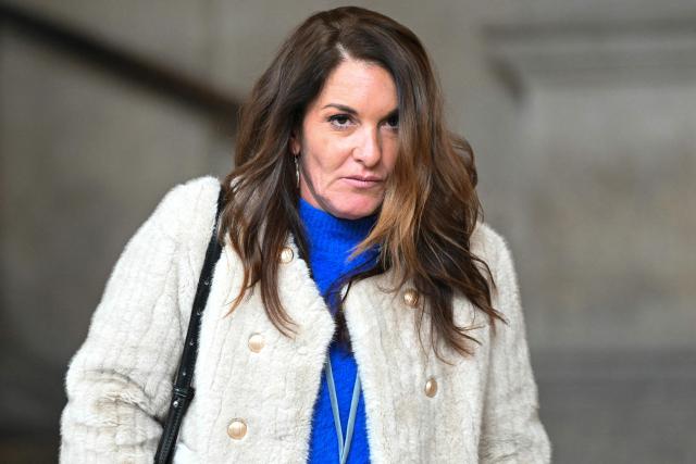 Sister of Samuel Paty Mickaelle Paty leaves during the appeal trial of four people accused of involvement in the jihadist beheading of schoolteacher Samuel Paty in 2020, at the Palais de Justice, Paris' courthouse on January 26, 2026. Samuel Paty, 47, was beheaded in October 2020 by an 18-year-old Islamist radical of Chechen origin after showing cartoons of the Prophet Mohammed in class. His killer, Abdoullakh Anzorov, later died in a shootout with the police. (Photo by Bertrand GUAY / AFP)