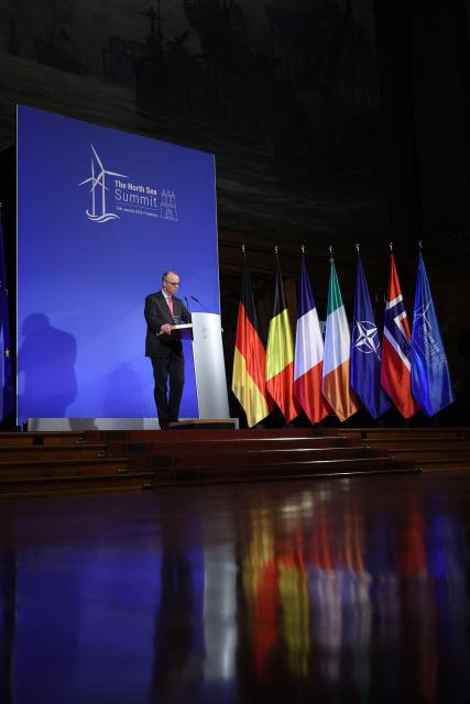 German Chancellor Friedrich Merz delivers his speech during the North Sea Summit on January 26, 2026 at the City Hall of Hamburg, northern Germany. European leaders meet to discuss North Sea energy and security cooperation, but fears over US designs on the Arctic island of Greenland may overshadow the talks. The region has long worried about threats posed by Russia -- but more recently tensions have surged over US President Donald Trump's push for the autonomous territory of Denmark. (Photo by Ronny HARTMANN / AFP)