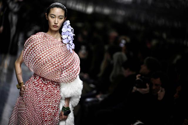 A model presents a creation for Christian Dior during the Women's Haute Couture Spring/Summer 2026 collection fashion show as part of the Paris Haute Couture Fashion Week, in Paris, on January 26, 2026. (Photo by JULIEN DE ROSA / AFP)