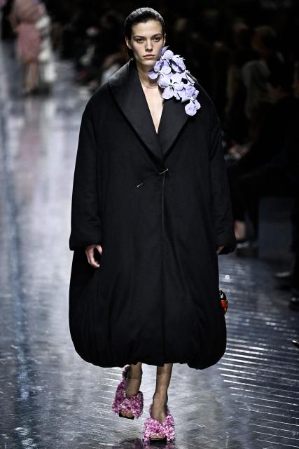 A model presents a creation for Christian Dior during the Women's Haute Couture Spring/Summer 2026 collection fashion show as part of the Paris Haute Couture Fashion Week, in Paris, on January 26, 2026. (Photo by JULIEN DE ROSA / AFP)