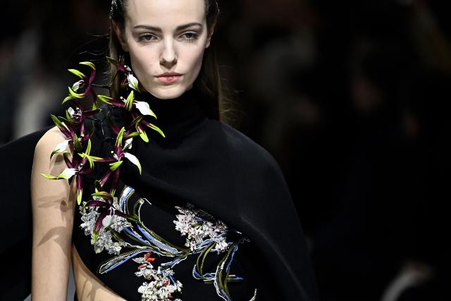 A model presents a creation for Christian Dior during the Women's Haute Couture Spring/Summer 2026 collection fashion show as part of the Paris Haute Couture Fashion Week, in Paris, on January 26, 2026. (Photo by JULIEN DE ROSA / AFP)