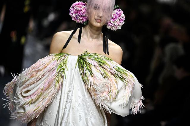 A model presents a creation for Christian Dior during the Women's Haute Couture Spring/Summer 2026 collection fashion show as part of the Paris Haute Couture Fashion Week, in Paris, on January 26, 2026. (Photo by JULIEN DE ROSA / AFP)