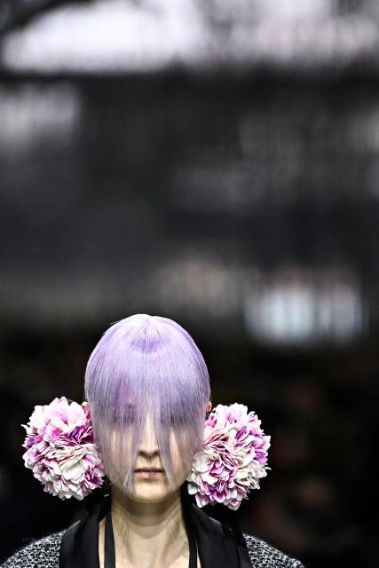 A model presents a creation for Christian Dior during the Women's Haute Couture Spring/Summer 2026 collection fashion show as part of the Paris Haute Couture Fashion Week, in Paris, on January 26, 2026. (Photo by JULIEN DE ROSA / AFP)
