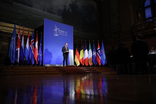 German Chancellor Friedrich Merz delivers his speech during the North Sea Summit on January 26, 2026 at the City Hall of Hamburg, northern Germany. European leaders meet to discuss North Sea energy and security cooperation, but fears over US designs on the Arctic island of Greenland may overshadow the talks. The region has long worried about threats posed by Russia -- but more recently tensions have surged over US President Donald Trump's push for the autonomous territory of Denmark. (Photo by Ronny HARTMANN / AFP)
