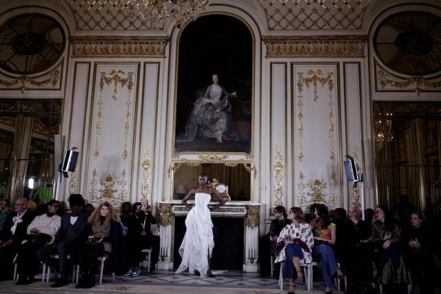 A model presents a creation by Imane Ayissi during the Women's Haute Couture Spring/Summer 2026 collection fashion show as part of the Paris Haute Couture Fashion Week, in Paris, on January 26, 2026. (Photo by STEPHANE DE SAKUTIN / AFP)