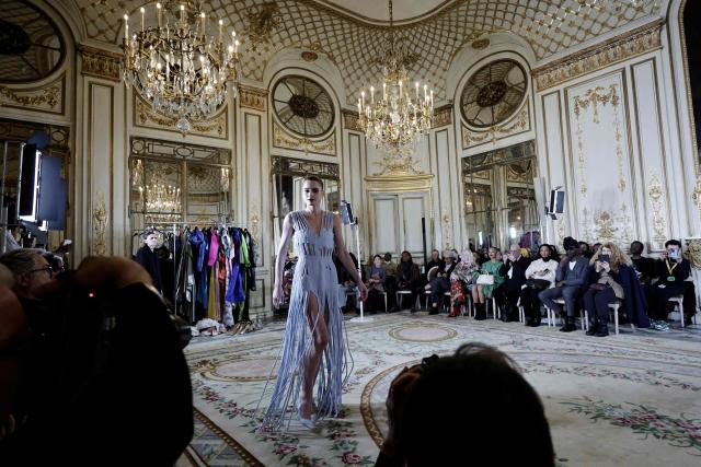 A model presents a creation by Imane Ayissi during the Women's Haute Couture Spring/Summer 2026 collection fashion show as part of the Paris Haute Couture Fashion Week, in Paris, on January 26, 2026. (Photo by STEPHANE DE SAKUTIN / AFP)