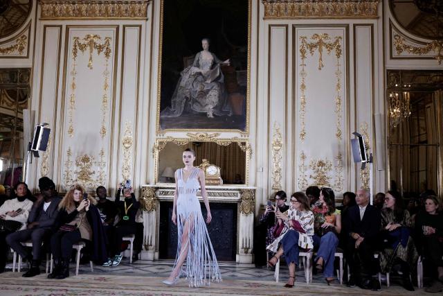 A model presents a creation by Imane Ayissi during the Women's Haute Couture Spring/Summer 2026 collection fashion show as part of the Paris Haute Couture Fashion Week, in Paris, on January 26, 2026. (Photo by STEPHANE DE SAKUTIN / AFP)