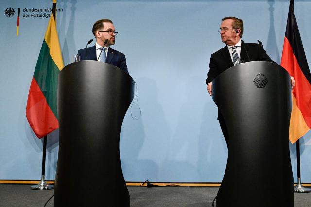 German Defence Minister Boris Pistorius (R) and Lithuania's defence minister Robertas Kaunas give a press conference at the defence ministry in Berlin, on January 26, 2026. (Photo by John MACDOUGALL / AFP)