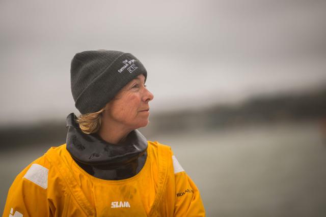 French skipper Alexia Barrier reacts as she and her crew sail towards the Brest harbour on the Ultim multihull Idec Sport after crossing the finish line of the Jules Verne Trophy, off the coast of Brest, Brittany, on January 26, 2026. French skipper Alexia Barrier (The Famous Project) and her six crew members completed on January 26, 2026, off the coast of Brest, the first non-stop round-the-world voyage in a maxi-trimaran with an all-female crew, her team announced. The Jules Verne Trophy is a prize for the fastest crewed, unassisted and non-stop circumnavigation of the world on any type of yacht. (Photo by Loic VENANCE / AFP)