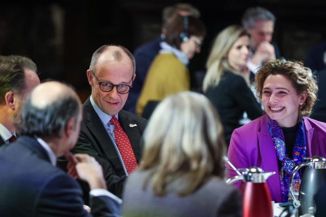 German Chancellor Friedrich Merz sits at a round table during the North Sea Summit on January 26, 2026 at the City Hall of Hamburg, northern Germany. European leaders meet to discuss North Sea energy and security cooperation, but fears over US designs on the Arctic island of Greenland may overshadow the talks. The region has long worried about threats posed by Russia -- but more recently tensions have surged over US President Donald Trump's push for the autonomous territory of Denmark. (Photo by Ronny HARTMANN / AFP)