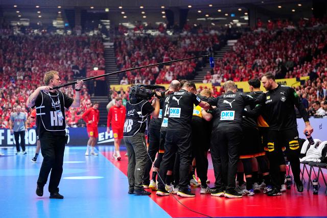 Germany's players gather prior the men's EHF Euro 2026 main round handball match Germany vs Denmark in Herning, Denmark, on January 26, 2026. (Photo by Bo Amstrup / Ritzau Scanpix / AFP) / Denmark OUT
