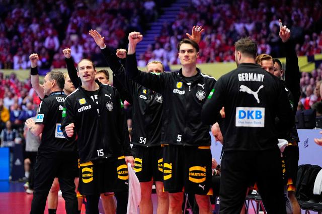 German players celebrate during the men's EHF Euro 2026 main round handball match Germany vs Denmark in Herning, Denmark, on January 26, 2026. (Photo by Bo Amstrup / Ritzau Scanpix / AFP) / Denmark OUT