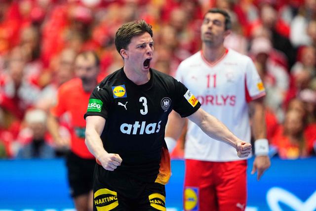 Germany's centre back #03 Nils Lichtlein celebrates during the men's EHF Euro 2026 main round handball match Germany vs Denmark in Herning, Denmark, on January 26, 2026. (Photo by Bo Amstrup / Ritzau Scanpix / AFP) / Denmark OUT