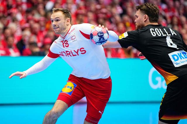 Germany's pivot #04 Johannes Golla and Denmark's right back #19 Mathias Gidsel vie for the ball during the men's EHF Euro 2026 main round handball match Germany vs Denmark in Herning, Denmark, on January 26, 2026. (Photo by Bo Amstrup / Ritzau Scanpix / AFP) / Denmark OUT
