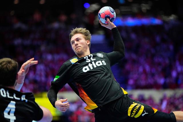 Germany's right back #32 Franz Semper shoots during the men's EHF Euro 2026 main round handball match Germany vs Denmark in Herning, Denmark, on January 26, 2026. (Photo by Bo Amstrup / Ritzau Scanpix / AFP) / Denmark OUT