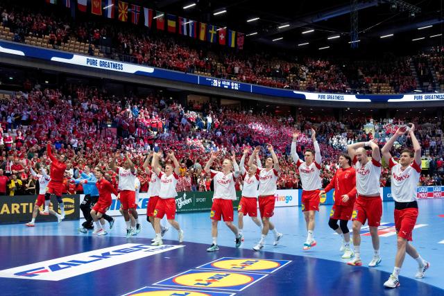 Denmark's players celebrate the victory with the fans during the men's EHF Euro 2026 main round handball match Germany vs Denmark in Herning, Denmark, on January 26, 2026. (Photo by Bo Amstrup / Ritzau Scanpix / AFP) / Denmark OUT