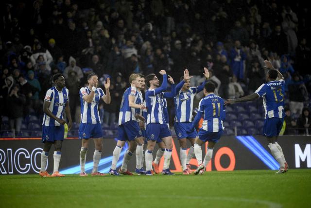 FC Porto's Portuguese defender #52 Martim Fernandes (C) celebrates scoring his team's second goal during the Portuguese League football match between FC Porto and Gil Vicente FC at Dragao stadium in Porto, on January 26, 2026. (Photo by Miguel RIOPA / AFP)