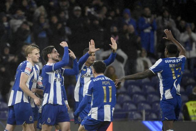 FC Porto's Portuguese defender #52 Martim Fernandes (2L) celebrates scoring his team's second goal during the Portuguese League football match between FC Porto and Gil Vicente FC at Dragao stadium in Porto, on January 26, 2026. (Photo by Miguel RIOPA / AFP)