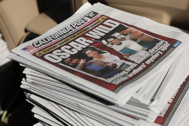 A stack of promotional print edition of the California Post newspaper await distribution during its launch day at the Larchmont Village neighborhood of Los Angeles, California on January 26, 2026. The California Post, a sister tabloid to the New York Post owned by Rupert Murdoch’s News Corp., launched on January 26 as a daily print and digital newspaper with coverage of news, sports, and entertainment. (Photo by Patrick T. Fallon / AFP)