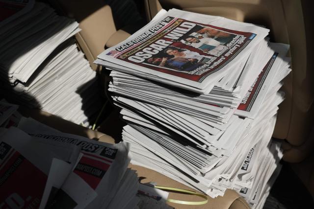 A stack of the promotional print edition of the California Post newspaper await distribution during its launch day at the Larchmont Village neighborhood of Los Angeles, California on January 26, 2026. The California Post, a sister tabloid to the New York Post owned by Rupert Murdoch’s News Corp., launched on January 26 as a daily print and digital newspaper with coverage of news, sports, and entertainment. (Photo by Patrick T. Fallon / AFP)