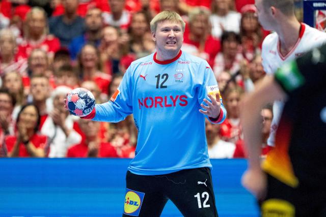 Denmark's goalkeeper #12 Emil Nielsen reacts during the men's EHF Euro 2026 main round handball match between Germany and Denmark at the at Jyske Bank Boxen Arena in Herning, Denmark, on January 26, 2026. (Photo by Bo Amstrup / Ritzau Scanpix / AFP) / Denmark OUT