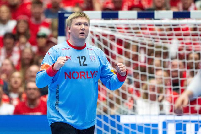 Denmark's goalkeeper #12 Emil Nielsen reacts after making a save during the men's EHF Euro 2026 main round handball match between Germany and Denmark at the at Jyske Bank Boxen Arena in Herning, Denmark, on January 26, 2026. (Photo by Bo Amstrup / Ritzau Scanpix / AFP) / Denmark OUT